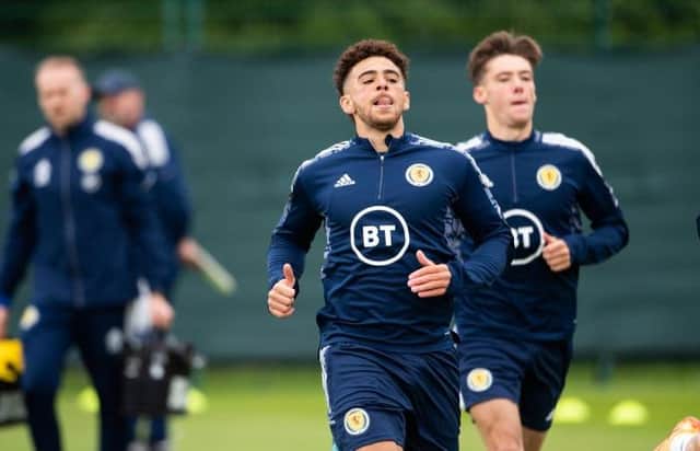 Striker Che Adams leading the way during a Scotland training session at Oriam in Edinburgh ahead of Wednesday night's World Cup play-off semi-final against Ukraine at Hampden. (Photo by Paul Devlin / SNS Group)