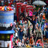Crowds throng the Royal Mile during the Edinburgh Festival Fringe (Picture: Jeff J Mitchell/Getty Images)