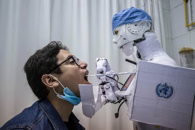 Artificially intelligent bots and robots may be capable of doing more jobs than we might expect (Picture: Khaled Desouki/AFP via Getty Images)