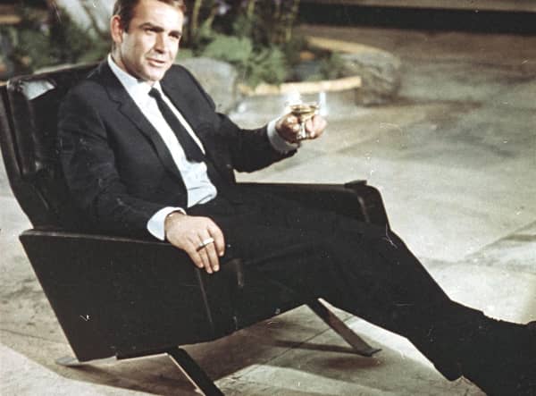 Sean Connery was disturbed by Bondmania from the moment a groupie dived through the window of his Aston Martin as he was driving to a premiere in Paris (Picture: AP)