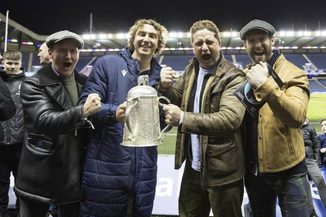 Ritchie celebrates with Gerard Butler and the Calcutta Cup.