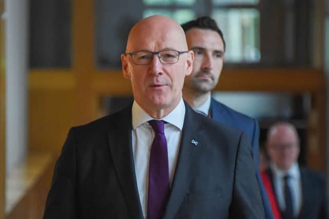 First Minister John Swinney.