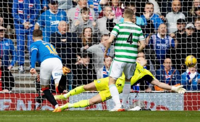 GLASGOW, SCOTLAND - APRIL 03: Rangers' Aaron Ramsey makes it 1-0, beating Celtic goalkeeper Joe Hart during a cinch Premiership match between Rangers and Celtic at Ibrox Stadium, on April 02, 2022, in Glasgow, Scotland.  (Photo by Craig Williamson / SNS Group)