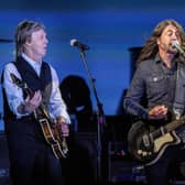 Paul McCartney, left, and Dave Grohl perform at the Glastonbury Festival in Worthy Farm, Somerset, England, Saturday, June 25, 2022.