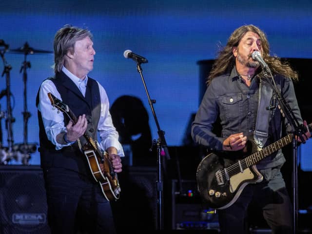 Paul McCartney, left, and Dave Grohl perform at the Glastonbury Festival in Worthy Farm, Somerset, England, Saturday, June 25, 2022.