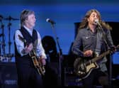 Paul McCartney, left, and Dave Grohl perform at the Glastonbury Festival in Worthy Farm, Somerset, England, Saturday, June 25, 2022.