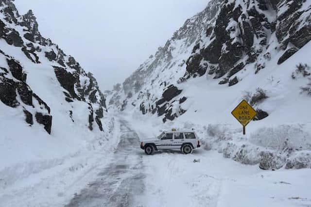 Emergency services rescued a driver left stranded on the road leading into California's Death Valley National Park as the west coast of the US is hit with unprecedented levels of snowfall. Picture: AP