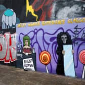 A Willy Wonka inspired mural appeared in Glasgow last month, based on the House of Illuminati failed event.
