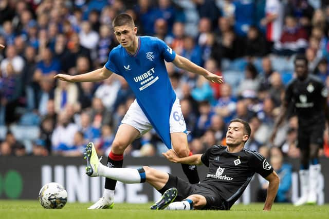 Rangers youngster Bailey Rice is pulled down by Hamburg's László Bénes during a pre-season friendly at Ibrox in July.  (Photo by Alan Harvey / SNS Group)