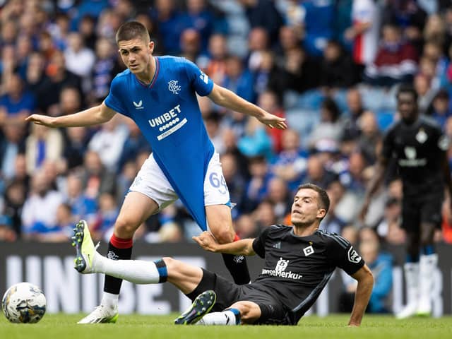 Rangers youngster Bailey Rice is pulled down by Hamburg's László Bénes during a pre-season friendly at Ibrox in July.  (Photo by Alan Harvey / SNS Group)