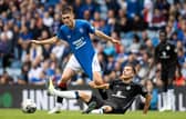 Rangers youngster Bailey Rice is pulled down by Hamburg's László Bénes during a pre-season friendly at Ibrox in July.  (Photo by Alan Harvey / SNS Group)