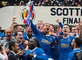 Rangers captain James Tavernier lifts the Scottish Cup after the 2-0 win over Hearts.