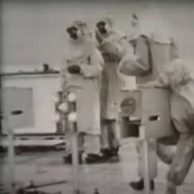 Government scientists with caged animals on a pontoon near Tolsta, Isle of Lewis, in 1952 as Operation Cauldron gets underway. PIC: YouTube.