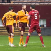 Kevin van Veen and Aberdeen defender Declan Gallagher exchange words after the Motherwell striker's equaliser  (Photo by Mark Scates / SNS Group)