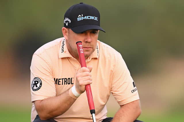 Richie Ramsay lines up a putt on the tenth green during round two of the Hero Dubai Desert Classic at Emirates Golf Club. Picture: Ross Kinnaird/Getty Images.