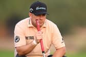 Richie Ramsay lines up a putt on the tenth green during round two of the Hero Dubai Desert Classic at Emirates Golf Club. Picture: Ross Kinnaird/Getty Images.