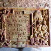 The  newly carved distance stone which will be placed close to the Antonine Wall to tell the story of the local Iron Age population who lived alongside the occupying Roman force. PIC: Rediscovering the Antonine Wall.