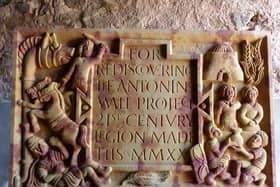 The  newly carved distance stone which will be placed close to the Antonine Wall to tell the story of the local Iron Age population who lived alongside the occupying Roman force. PIC: Rediscovering the Antonine Wall.