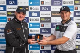 Paul Lawrie, who set up the Tartan Pro Tour, presents Neil Fenwick with a watch after one of his victories on the circuit last season. Picture: Kenny Smith