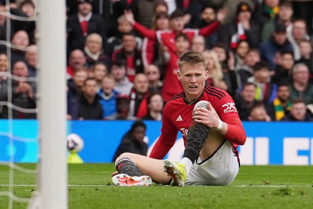 Manchester United's Scott McTominay sits injured during the Premier League match at Old Trafford, Manchester.  (Picture: Martin Rickett/PA Images)