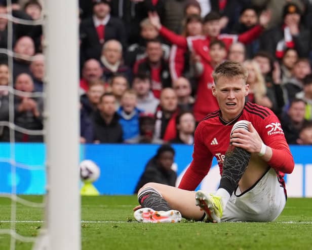 Manchester United's Scott McTominay sits injured during the Premier League match at Old Trafford, Manchester.  (Picture: Martin Rickett/PA Images)