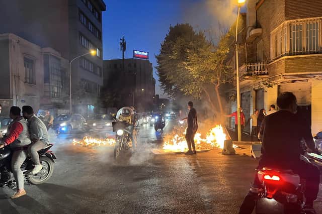 Protests against the Iranian regime, like this one in Tehran on Saturday, have been held across the country in recent weeks (Picture: AFP via Getty Images)