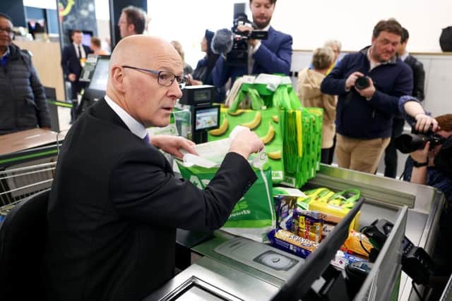 First Minister John Swinney has said he wants to legally cap the price of up to 50 'essential' food items in supermarkets
