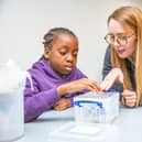 Emma Robson from Scottish Water with a pupil from St Pius primary school in Dundee