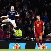 Scott McTominay celebrates opening the scoring for Scotland against Spain.