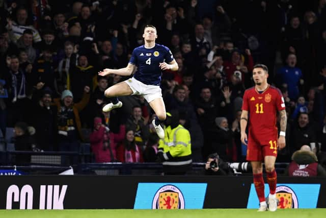 Scott McTominay celebrates opening the scoring for Scotland against Spain.