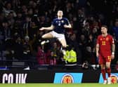 Scott McTominay celebrates opening the scoring for Scotland against Spain.