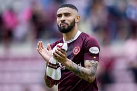 Josh Ginnelly applauds the Hearts fans after the 1-1 draw with Hibs at Tynecastle.