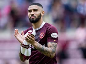 Josh Ginnelly applauds the Hearts fans after the 1-1 draw with Hibs at Tynecastle.