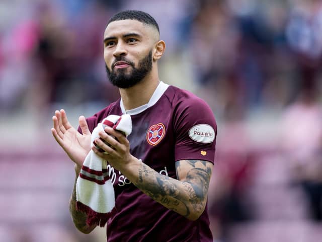 Josh Ginnelly applauds the Hearts fans after the 1-1 draw with Hibs at Tynecastle.