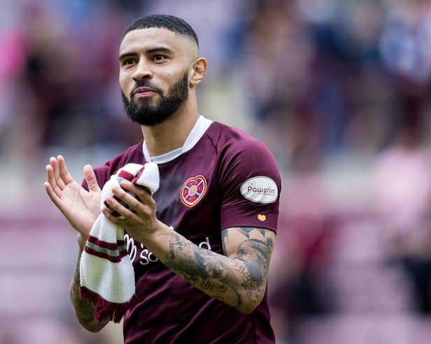 Josh Ginnelly applauds the Hearts fans after the 1-1 draw with Hibs at Tynecastle.