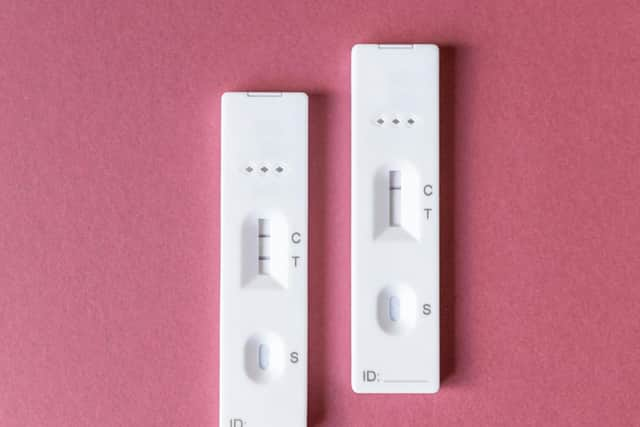 A positive lateral flow test (left) will feature two lines adjacent to C and T, whereas a negative lateral flow test (right) will only feature one red line next to C. (Image credit: annastories/Canva Pro)