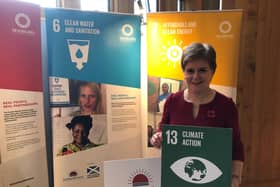 First Minister Nicola Sturgeon at the pop-up Scotland Malawi Partnership exhibition at the Scottish Parliament