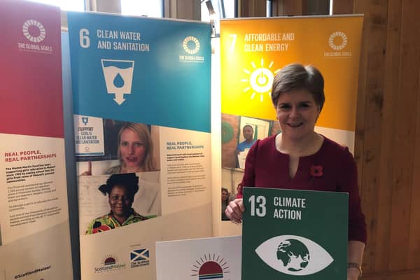 First Minister Nicola Sturgeon at the pop-up Scotland Malawi Partnership exhibition at the Scottish Parliament
