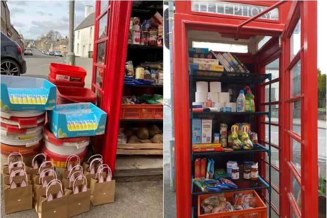 A red telephone box has been transformed into a 'community larde