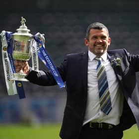 St Johnstone manager Callum Davidson celebrates with the Scottish Cup after his team's 1-0 win over Hibernian in the final at Hampden. (Photo by Ian MacNicol/Getty Images)