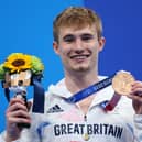 Jack Laugher poses with his bronze medal