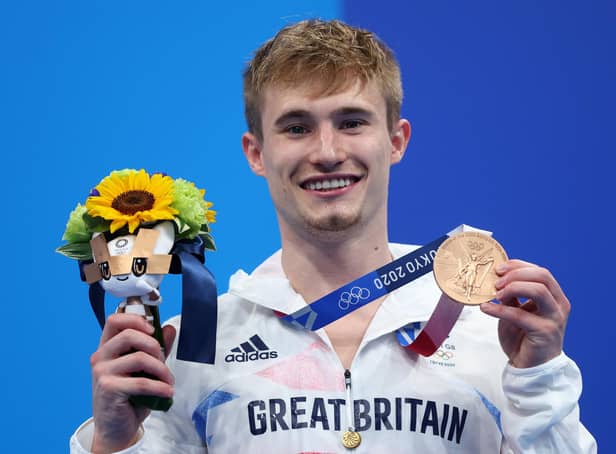 Jack Laugher poses with his bronze medal