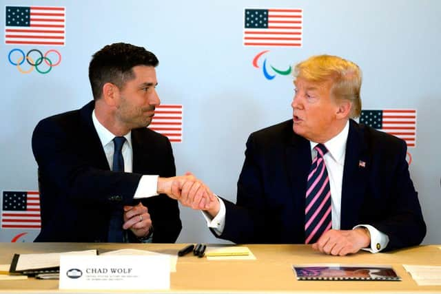 Donald Trump shakes hands with Acting Department of Homeland Security Secretary Chad Wolf in February 2020 (Photo: JIM WATSON/AFP via Getty Images)