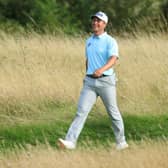 Calum Hill smiles as he walks on the 17th hole in the second round of the Cazoo Classic at the London Golf Club. Picture: Andrew Redington/Getty Images.