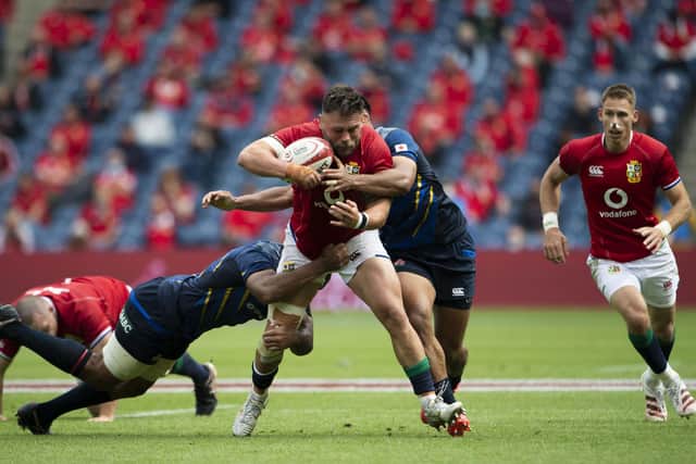 The Lions' Rory Sutherland makes a break against Japan at BT Murrayfield.