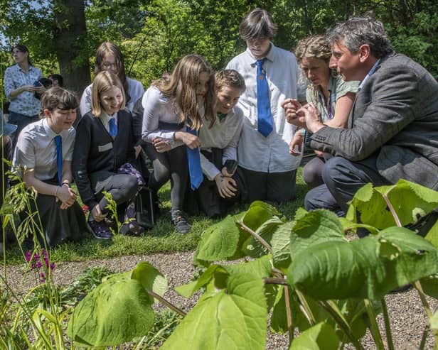Dr Emma Bush and Raoul Curtis-Machin engaging with school pupils on the potential for using nature based solutions to benefit urban environments (Pic: RBGE)