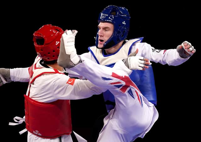 Great Britain's Bradley Sinden (right) in action against Turkey's Hakan Recber during his quarter-final match at the Tokyo 2020 Olympic Games. Picture: Mike Egeton/PA Wire