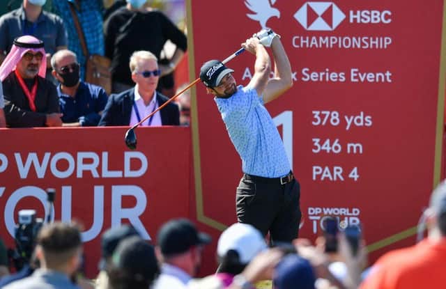 Watched by European Tour chief Keith Pelley, Scott Jamieson tees off in the final round of the Abu Dhabi HSBC Championship at Yas Links on Sunday. Picture: Ryan Lim/AFP via Getty Images.