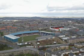 Tale of two grounds: Dundee's Dens Park sits in the foreground and Tannadice, home of rivals Dundee United, sits beyond it.