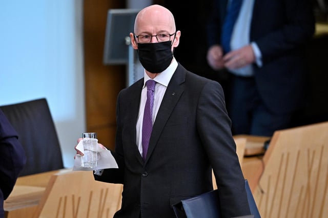 Deputy First Minister John Swinney has been accused of secrecy around the failure to publish a report into Scottish education.